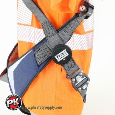 Close-up of a black and gray DBI-SALA Suspension Trauma Strap 9501403 by 3M Fall Protection, an essential harness accessory, attached to an orange safety vest. The PK Safety Supply logo and website URL appear in the lower left corner.