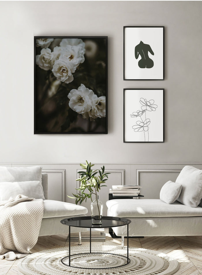 "Petals at Dusk" is a flower photography poster by Opposite Wall of white flowers in low lighting.