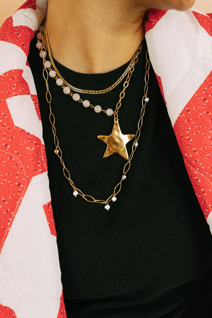 BELJOY Starry beaded chain necklace featuring a delicate design with star-shaped beads and a secure clasp.